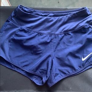 Dark blue nike running shorts